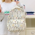 Cream student backpack with colorful star graffiti pattern and front pocket detail - Graffiti Smile Pattern