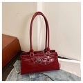 Chic red faux leather handbag with silver buckle and straps in a trendy retro style - Burgundy
