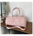 Pink nylon duffel bag for fitness and travel with adjustable shoulder strap and hand grips - Pink