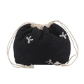 Black quilted drawstring bucket bag featuring white floral embroidery and woven cords - Black