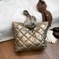 Champagne gold quilted tote bag with large capacity and metallic gloss finish - Gold