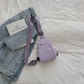 Minimalist lavender nylon chest bag with adjustable strap and multiple zipper pockets - Purple