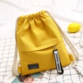 Gele minimalistische canvas rugzak met trekkoord en katoenen bandjes voor dames - Geel