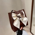 Brown PU leather tote bag featuring a large cream bow detail with sturdy dual handles - Coffee Base White Bow
