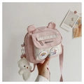 Pink canvas shoulder bag featuring 3D bear ears and a clear PVC front pocket detail - Pink