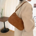 Detailed texture of brown corduroy shoulder bag styled with a minimalist beige blazer - Simple Strap Style / Strap Brown