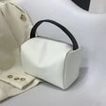 Minimalist white crossbody square bag with contrast black handle and zipper closure - White