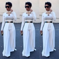 Detail van witte jumpsuit met splitrok-overlay en goudkleurige riem met metalen oogjes - M / Wit
