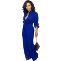 Close-up of royal blue long sleeve jumpsuit with waist tie and button-up collar detail - S / Blue