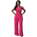 Close-up of fuchsia high-waisted wide-leg jumpsuit with brown belt and button detail - Rose Red