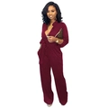 Detail of wine red deep V-neck jumpsuit with long sleeves, tie waist, and wide leg design - S / Burgundy