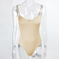 Close-up of beige V-neck bodysuit featuring thin straps and high-stretch glossy fabric - L / Apricot
