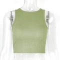 Close-up of light green ribbed knit crop top featuring a crew neck and sleeveless cut - S / Standard / Matcha Green