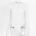 Detail of white ribbed bodysuit featuring a buttoned Henley neckline and long sleeves - S / White