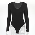 Detailed view of black slim fit V-neck long sleeve bodysuit with seamless bottom - S / Black