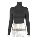 Detailed front view of women's black slim fit turtleneck crop top on a clear mannequin - S / Black