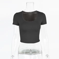 Detail view of the stitching and U-neckline on this slim black cropped T-shirt - S / Black