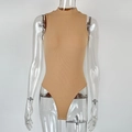 Detail view of khaki ribbed knit mock neck bodysuit with snap button closure - S / Apricot