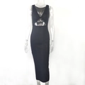 Detail of black sleeveless dress featuring a knot chest detail and waist cut-out design - S / Black