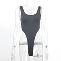Detail of dark grey ribbed knit bodysuit featuring high-cut leg and deep U-neckline design - S / Dark Gray