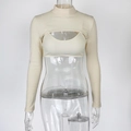 Detail van gebroken witte ribgebreide crop top en shrug met lange mouwen en uitsnijding - S / Tops / Abrikoos