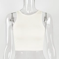 Detail of cream white ribbed knit cotton cropped tank top showing fabric texture - S / White