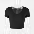 Detailed view of the ribbed knit fabric and V-neckline on the black short sleeve crop top - S / Black