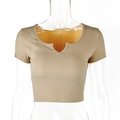 Detail of khaki ribbed cotton crop top featuring unique V-neckline and slim fit texture - S / Apricot