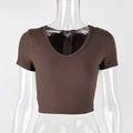 Close-up of brown ribbed cotton fabric texture on a slim-fit V-neck short sleeve top - S / Coffee