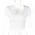 Close-up of the small V-neckline detail and ribbed cotton texture on a white crop top - S / White