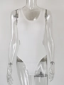 Detailed view of white ribbed bodysuit featuring side cut-out and u-neck design - S / White
