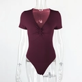 Detailed view of the twisted knot chest design and ribbed texture of the wine red bodysuit - S / Burgundy