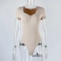 Detail of ribbed knit texture and ruched sweetheart neckline on beige short sleeve bodysuit - S / Apricot