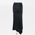 Detail view of the elegant ruched texture on the black slim fit maxi skirt for women - S / Black