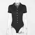 Detail of black ribbed bodysuit featuring contrast white buttons and polo collar - S / Black