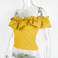 Close-up of vibrant yellow off-shoulder top featuring ruffled neckline and ribbed texture - S / Yellow