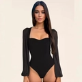 Slim fit black bodysuit featuring sheer mesh lantern sleeves and a sweetheart neckline - S / Black
