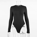 Detailed close-up of ribbed knit texture on a black long sleeve crewneck bodysuit - S / Black