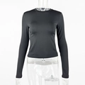 Front view of black slim-fit crew neck long sleeve tee on transparent mannequin - S / Black