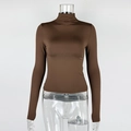 Detail view of coffee brown long sleeve slim-fit turtleneck top with silky texture - S / Coffee