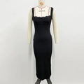 Detailed view of elegant black lace trim on the neckline of a slim fit maxi dress - S / Black