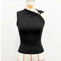 Detail of black slim-fit vest with asymmetric neckline and golden metal rings decoration - XS / Black