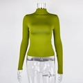 Front view of grass green slim fit mock neck long sleeve top on a mannequin - S / Green
