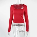 Dettaglio dello scollo quadrato e della trama in maglia di questo top rosso aderente - Taglia M / Rosso