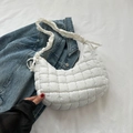 White quilted shoulder bag with puffy cloud texture and ruched strap for daily commute - White