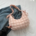 Quilted light pink shoulder bag with ruffled strap and bow detail on denim jacket - Pink
