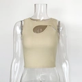 Detail view of the ribbed knit fabric and cutout design on this beige crop tank top - S / Apricot