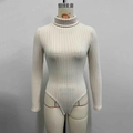 Detail of the high turtleneck and ribbed knit texture on the off-white long sleeve bodysuit - S / Apricot