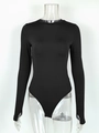 Detail of black long-sleeve bodysuit featuring thumbhole cuffs on a clear mannequin - S / Black