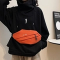 Orange canvas chest bag with unique pleated design and white embroidery on shoulder - Orange